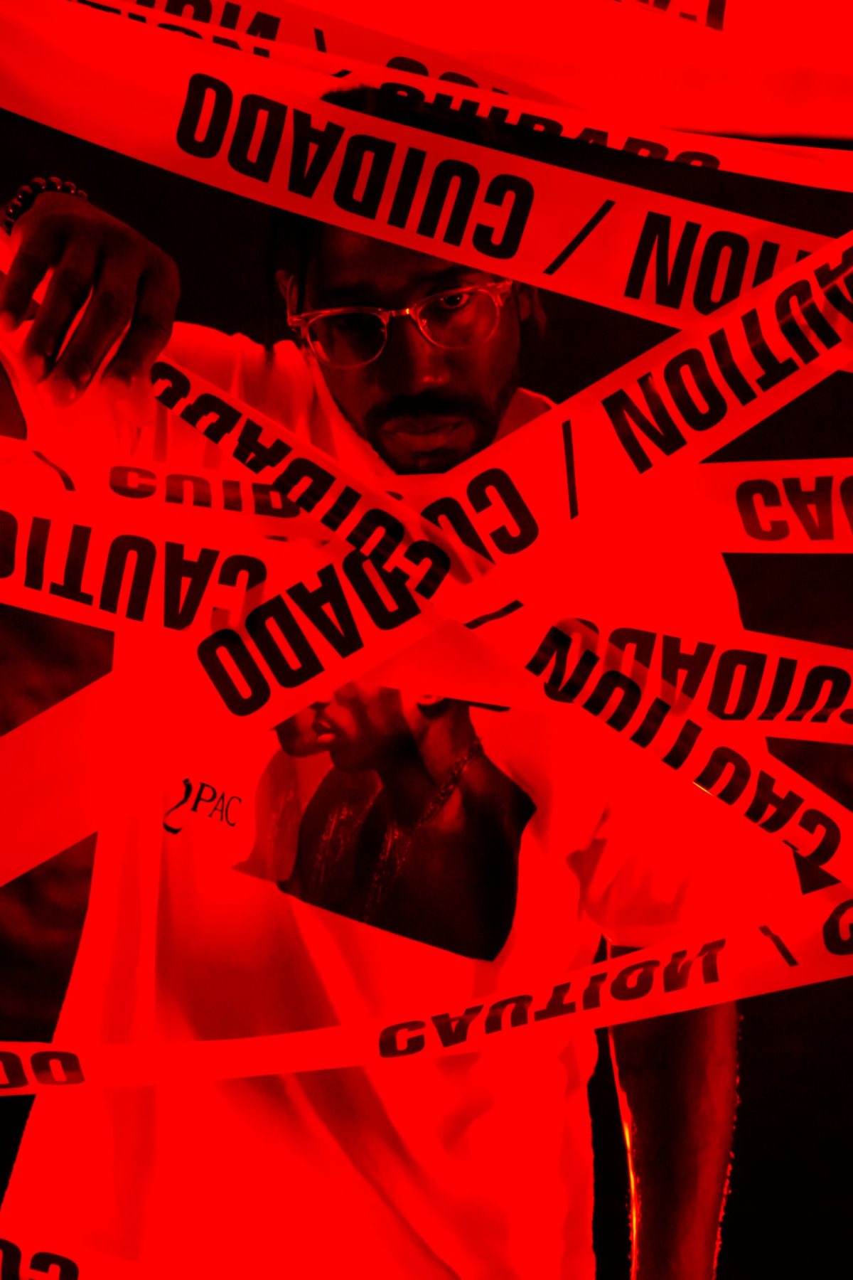 Portrait behind red caution tape